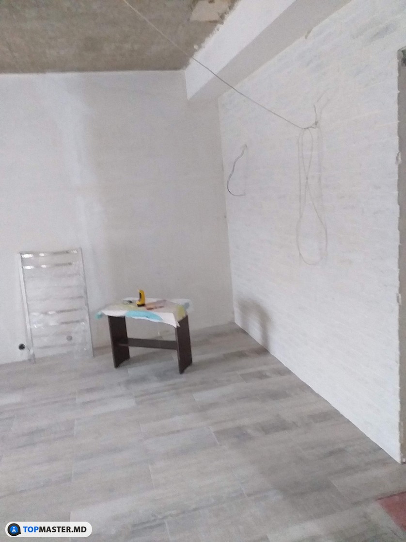 Монтаж напольной плитки в комнате и коридоре. изображение 1